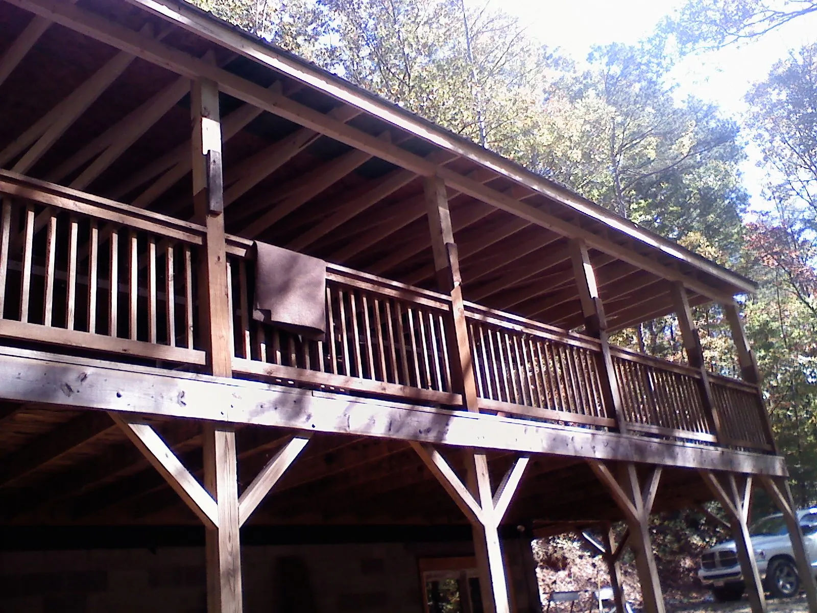 Timber framing under a new elevated porch and deck — Roof Leak Repair in Wolfe City by Roofing Brothers